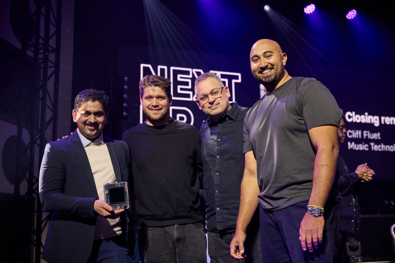 The 2025 accelerator winner WizeMice receiving the award on stage at #musictech at Slush